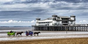 Image of horse and cart on weston super mare beach on day trips from bristol
